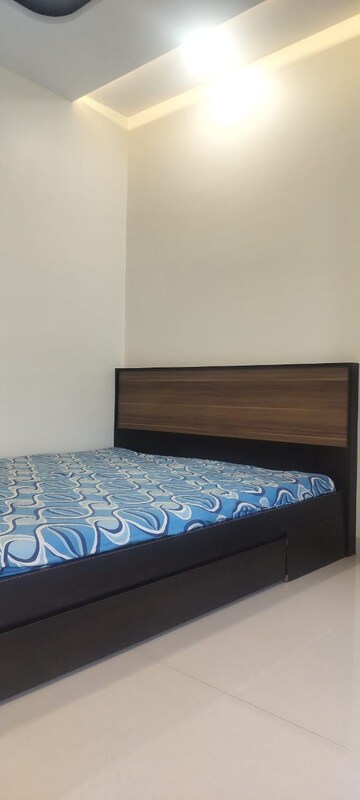 Bedroom in 2 BHK Apartment at Romell Umiya Grandeur, Goregaon East – for Rent