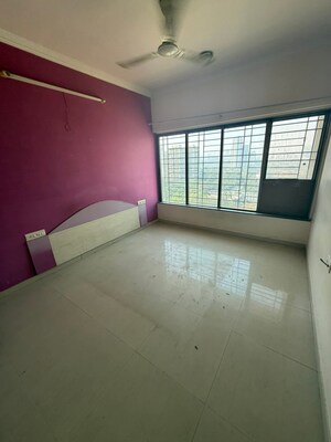 Room in 2 BHK Apartment at Raheja Willows, Kandivali East – for Rent