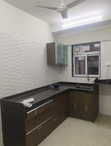 Kitchen in 2 BHK Apartment at Chandiwala Pearl Regency, Andheri West – for Rent