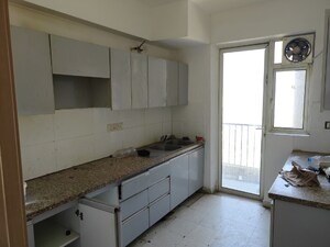 Kitchen in 4 BHK Apartment at DLF New Town Heights II, Sector 86 – for Rent