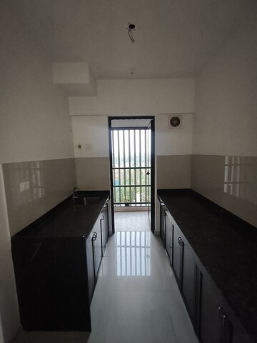 Kitchen in 1 BHK Apartment at Lodha Downtown, Dombivli East – for Rent