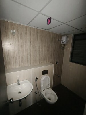 Bathroom in 1 BHK Apartment at Lodha Downtown, Dombivli East – for Rent