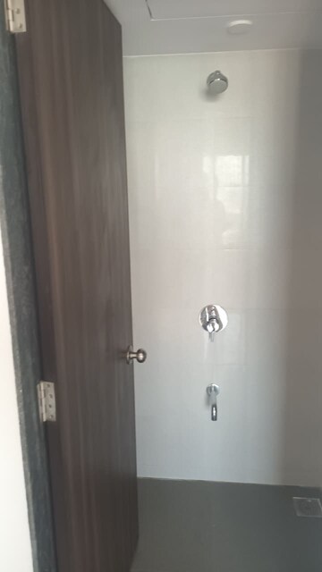 Bathroom in 1 BHK Apartment at Puranik Hometown, Ghodbunder Road – for Rent