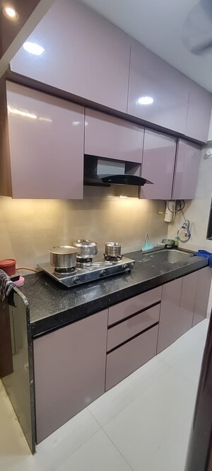 Kitchen in 1 BHK Apartment at Rosa Gardenia, Ghodbunder Road – for Rent