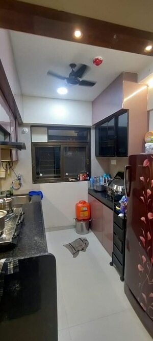 Kitchen in 1 BHK Apartment at Rosa Gardenia, Ghodbunder Road – for Rent