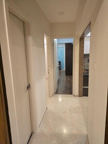 Building Lobby in 2 BHK Apartment at Paradise Sai World Empire, Kharghar – for Rent