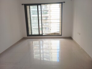 Room in 2 BHK Apartment at Acme Ozone, Manpada – for Sale