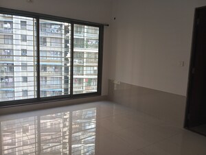 Room in 2 BHK Apartment at Acme Ozone, Manpada – for Sale