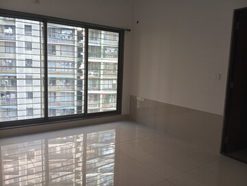 Room in 2 BHK Apartment at Acme Ozone, Manpada – for Sale