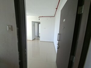 Building Lobby in 1 BHK Apartment at Puranik City, Kasarvadavali – for Rent