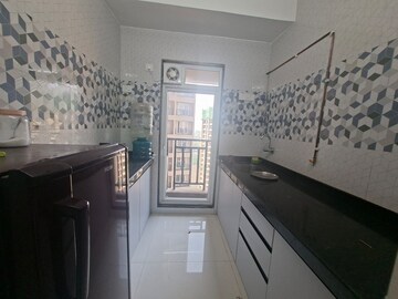 Kitchen in 1 BHK Apartment at Puraniks City Reserva, Ghodbunder Road – for Rent