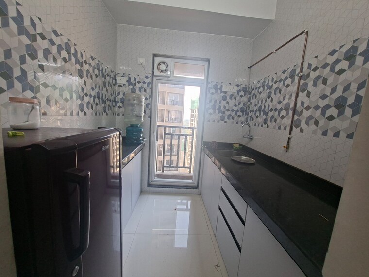 Kitchen, puraniks-city-reserva 1 Bedroom 447 Sq.Ft. Apartment In Ghodbunder Road Thane 9640636
