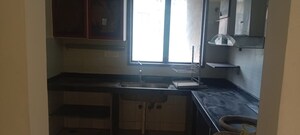 Kitchen in 2 BHK Apartment at Cosmos Lounge, Manpada – for Rent