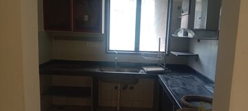 Kitchen in 2 BHK Apartment at Cosmos Lounge, Manpada – for Rent