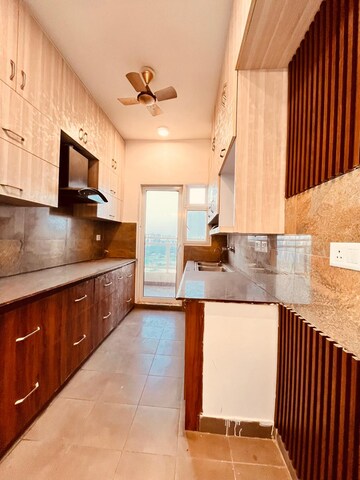Kitchen in 3 BHK Apartment at Elite Golf Green, Sector 79 – for Rent