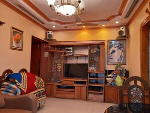 Living Room in 1 BHK Apartment at Satellite Garden, Goregaon East – for Rent