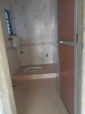Bathroom in 3 BHK Apartment at Hari Om Heritage, Kharghar – for Rent