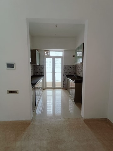 Kitchen in 2 BHK Apartment at Omkar Alta Monte, Malad East – for Rent