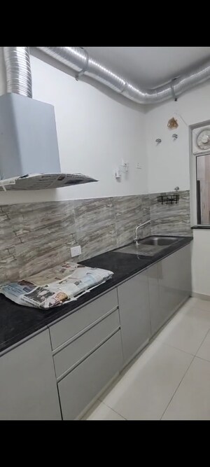 Kitchen in 2 BHK Apartment at Shapoorji Pallonji Joyville Phase 2, Sector 102 – for Sale
