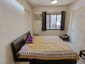 Bedroom in 1 BHK Apartment at Vardhaman Lotus Tower, Gawand Baug – for Rent