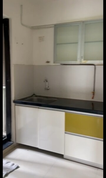 Kitchen in 1.5 BHK Apartment at Pride World City Long Island, Charholi Budruk – for Sale