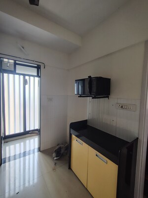 Staircase in 2 BHK Apartment at DB Orchid Suburbia, Kandivali West – for Sale