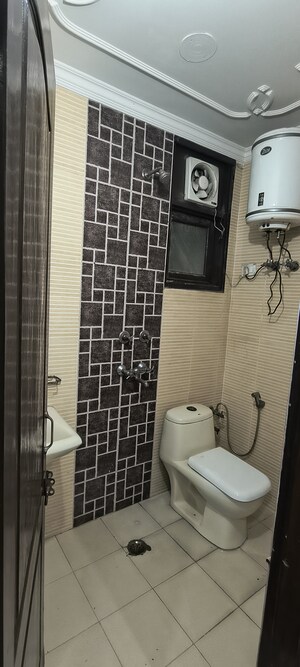 Bathroom in 3 BHK Builder Floor at Khirki Extension – for Rent
