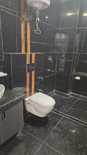 Bathroom in 1 BHK Apartment at Ansal Celebrity Suites, Sector 2 – for Rent