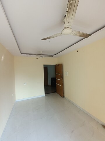 Living Room in 1 BHK Apartment at Shree Ostwal Orchid Building No 9 to 12, Mira Road – for Sale