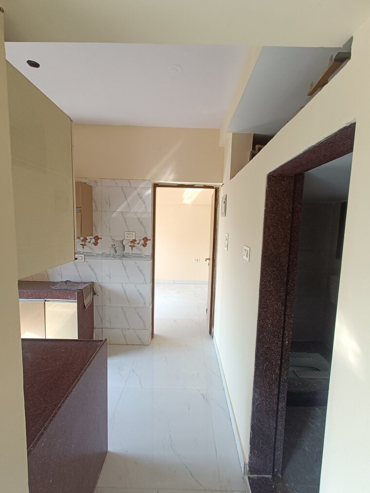 Kitchen, shree-ostwal-orchid-building-no-9-to-12 1 Bedroom 695 Sq.Ft. Apartment In Mira Road Thane 9642919