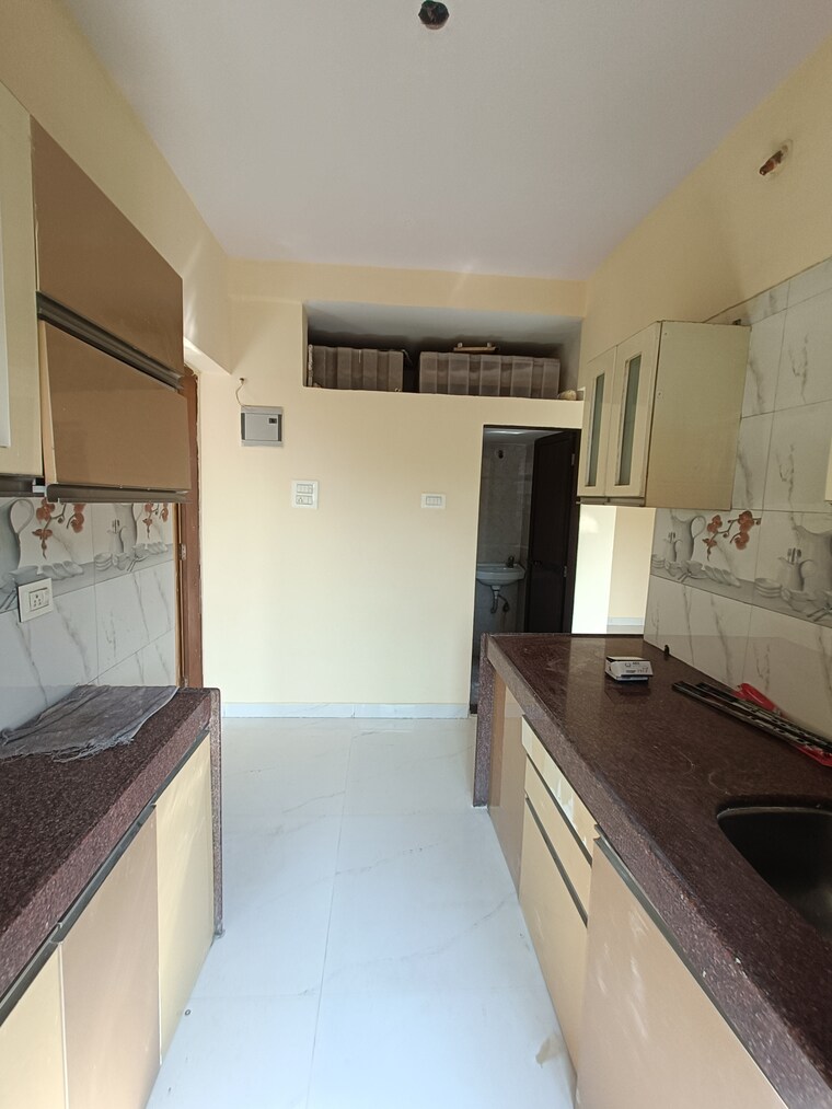 Kitchen, shree-ostwal-orchid-building-no-9-to-12 1 Bedroom 695 Sq.Ft. Apartment In Mira Road Thane 9642919