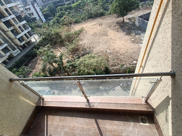 Balcony, shree-ostwal-orchid-building-no-9-to-12 1 Bedroom 695 Sq.Ft. Apartment In Mira Road Thane 9642919
