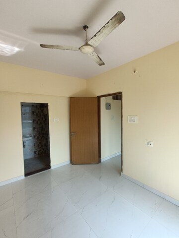 Master Bedroom in 1 BHK Apartment at Shree Ostwal Orchid Building No 9 to 12, Mira Road – for Sale