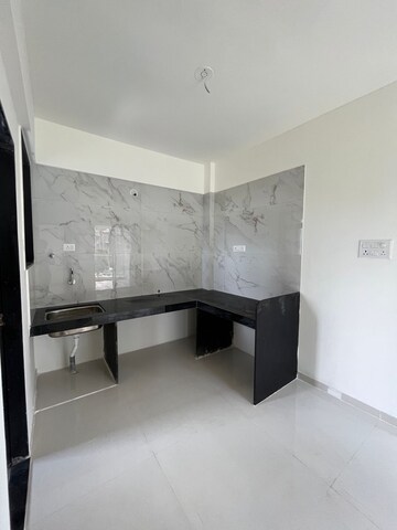 Kitchen in 2 BHK Apartment at Nirman Milestone, Ravet – for Rent