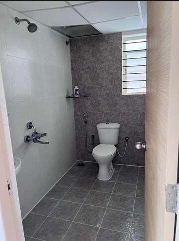 Bathroom in 2 BHK Apartment at Kumari Woods And Winds, Chansandra – for Sale