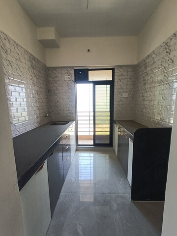 Kitchen in 2 BHK Apartment at Shree Ostwal Horizon, Mira Road – for Sale