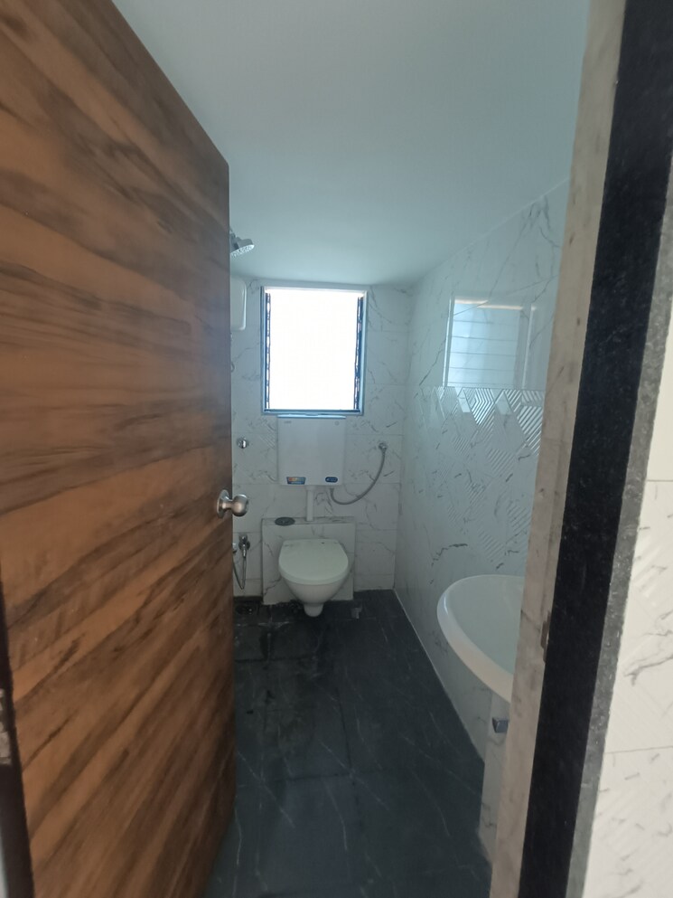 Bathroom, shree-ostwal-horizon 2 Bedroom 700 Sq.Ft. Apartment In Mira Road Thane 9643253