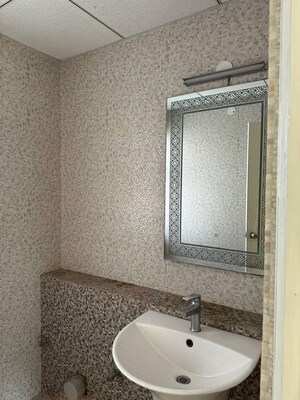 Bathroom in 2 BHK Apartment at Ambience Creacions, Sector 22 – for Rent