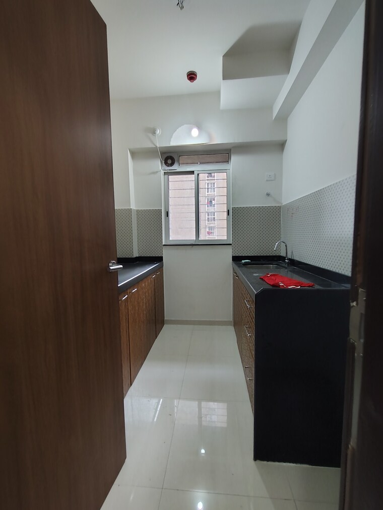 Kitchen, lodha-amara-wing-40-and-41 1 Bedroom 450 Sq.Ft. Apartment In Kolshet Road Thane 9643393