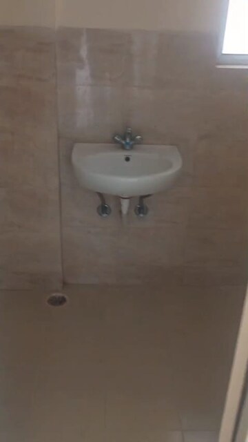 Bathroom in 2 BHK Apartment at Wave Dream Homes, Wave City – for Rent