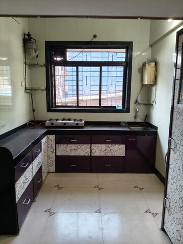 Kitchen in 2 BHK Apartment at Seawood Ganpati Complex, Nerul Sector 27 – for Rent