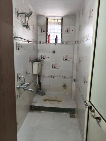 Bathroom in 2 BHK Apartment at Seawood Ganpati Complex, Nerul Sector 27 – for Rent
