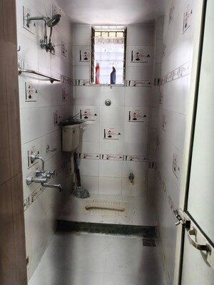 Bathroom in 2 BHK Apartment at Seawood Ganpati Complex, Nerul Sector 27 – for Rent