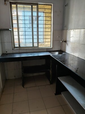 Kitchen in 2 BHK Apartment at Apna Pariwar CHS, Nerul – for Rent