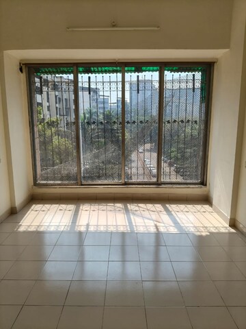 Room in 2 BHK Apartment at Safal Park, Nerul – for Rent