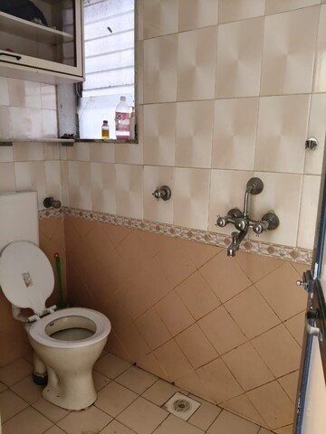 Bathroom in 2 BHK Apartment at Safal Park, Nerul – for Rent