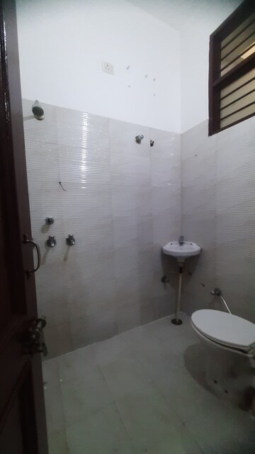 Bathroom in 2 BHK Apartment at Dhakoli – for Sale