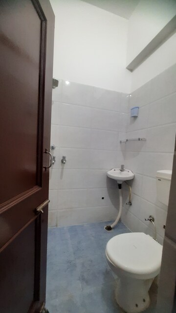Bathroom in 2 BHK Apartment at Dhakoli – for Sale