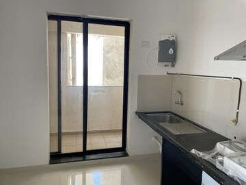 Kitchen in 3 BHK Apartment at Pride Kingsbury Phase 2, Charholi Budruk – for Rent