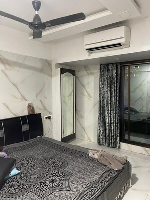 Living Room in 2 BHK Apartment at Tharwani Rosewood Heights, Kharghar Sector 10 – for Rent